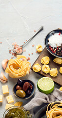 Italian pasta assortment on light background.