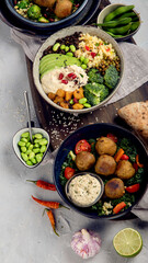 Vegan dishes assortment on light background.
