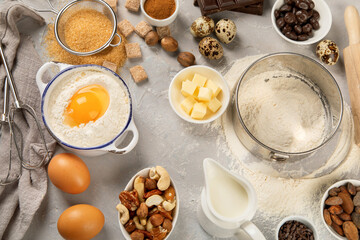 Cooking ingredients on light background.