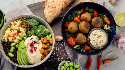 Vegan dishes assortment on light background.