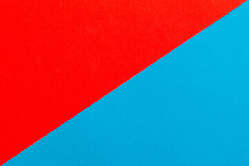 斜めの境界線で分割された赤と青の領域 - obrazy, fototapety, plakaty