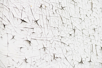 Wall texture with cracked paint closeup