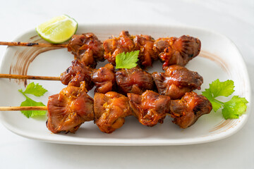 grilled chicken gizzard skewer with herbs and spices