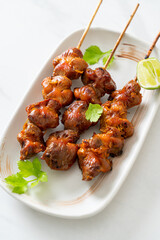 grilled chicken gizzard skewer with herbs and spices