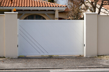 steel modern white gate aluminum portal with blades design of suburban house