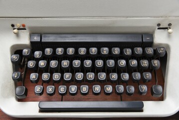 old typewriter on a wooden table