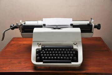 vintage typewriter with paper