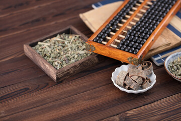 Abacus and medicine books and several herbs