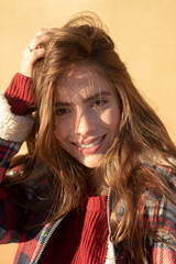 Close up face of young stylish woman. Beautiful fashionable girl outdoor portrait. Lifestyle, walk outdoors, enjoying life.