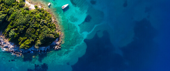 Coast as a background from top view. Turquoise water background from top view. Summer seascape from air.