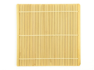 Top view, bamboo mat isolated on a white background. Use for home or restaurant, food design. Kitchen accessory. Japanese style.