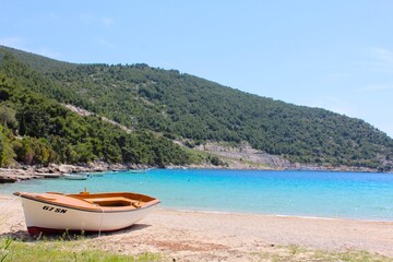 Plakat boat on the beach