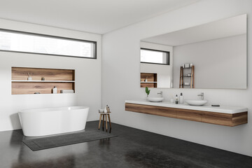 Fototapeta na wymiar Light bathroom interior with sink and mirror, bathtub and decoration