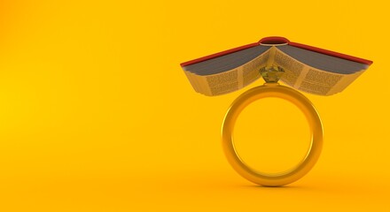 Fototapeta premium Engagement ring under book