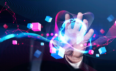 Businessman wearing suit is holding virtual globe in his hand