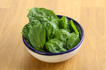 Fresh green spinach leaves in the bowl