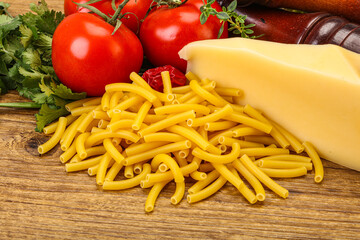 Italian pasta raw Maccheroni for cooking