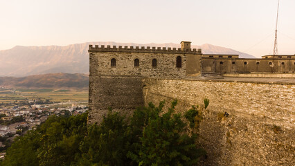 Fototapeta na wymiar Historical UNESCO protected town of Gjirocaster with a castle on the top of the hill, Southern Albania. Panoramic photo