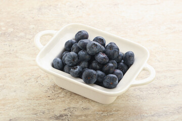 Sweet ripe blueberry heap in the bowl