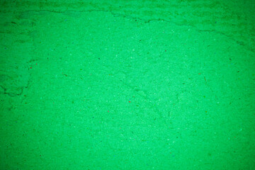 Green torn paper recycling cardboard texture.