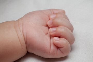 Baby hand new born.