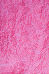 Naklejka premium Crumpled vintage red paper textured obsolete background.