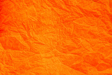 Obraz premium Crumpled vintage Orange paper textured obsolete background.