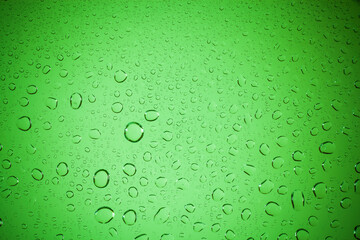 water drops on Brown glass background.