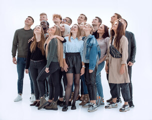 group of happy young people looking at copy space