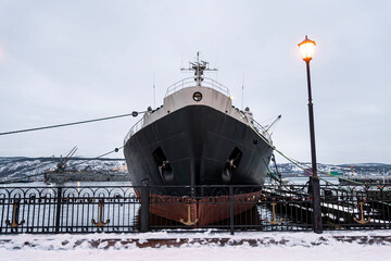 Nuclear icebreaker Lenin in port of Murmansk in winter. the inscription on the ship LENIN