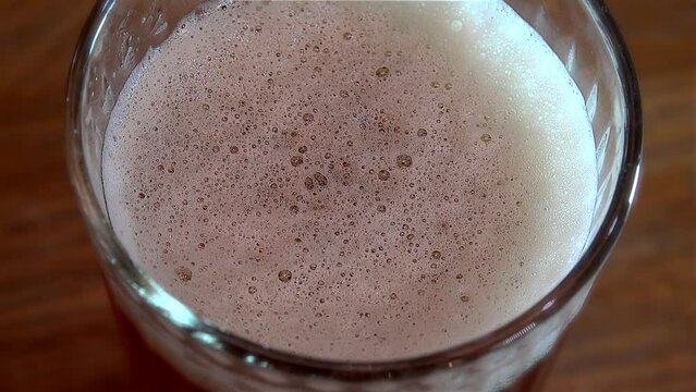 Top view of the mug with Beer foam (Beer head).  
