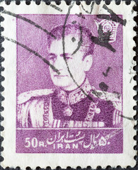 Iran - circa 1958: a postage stamp from Iran , showing a portrait of Mohammad Rezā Shāh Pahlavī...