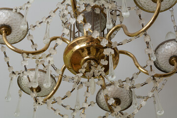 Chandelier with pendants painted in gold