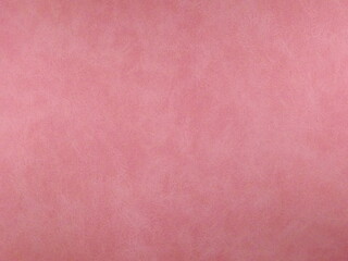 Pink suede surface textured as a background. High quality photo
