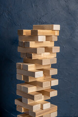 Board game. Tower build of wooden blocks.