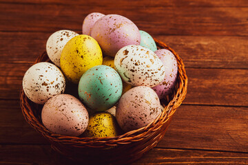 Hand painted pastel colored Easter eggs background. Happy Easter greeting card or invitation.