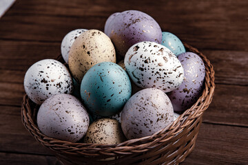 Hand painted pastel colored Easter eggs background. Happy Easter greeting card or invitation.