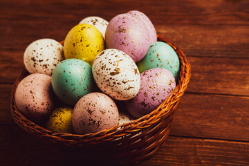 Hand painted pastel colored Easter eggs background. Happy Easter greeting card or invitation.