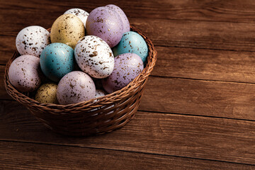 Hand painted pastel colored Easter eggs background. Happy Easter greeting card or invitation.