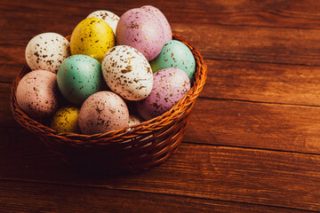 Hand painted pastel colored Easter eggs background. Happy Easter greeting card or invitation.