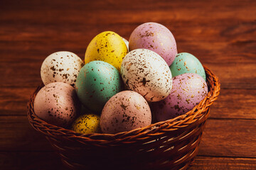 Hand painted pastel colored Easter eggs background. Happy Easter greeting card or invitation.