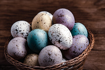 Hand painted pastel colored Easter eggs background. Happy Easter greeting card or invitation.