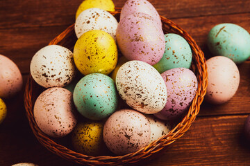 Hand painted pastel colored Easter eggs background. Happy Easter greeting card or invitation.