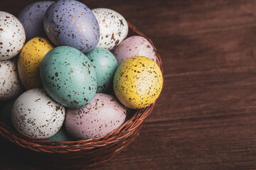 Hand painted pastel colored Easter eggs background. Happy Easter greeting card or invitation.