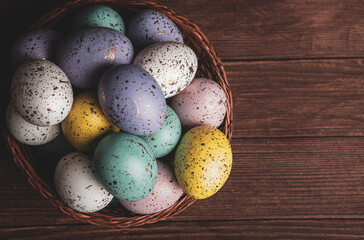 Hand painted pastel colored Easter eggs background. Happy Easter greeting card or invitation.