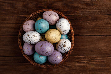 Hand painted pastel colored Easter eggs background. Happy Easter greeting card or invitation.