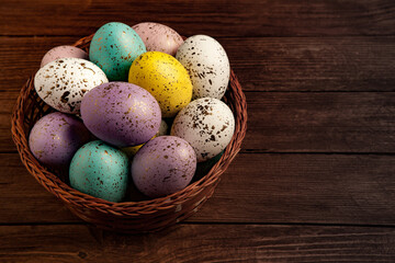 Hand painted pastel colored Easter eggs background. Happy Easter greeting card or invitation.