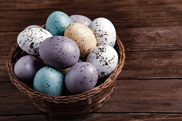 Hand painted pastel colored Easter eggs background. Happy Easter greeting card or invitation.