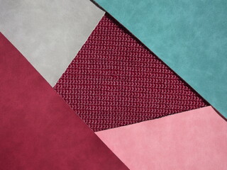  red, burgundy, blue, gray geometric shapes as background, knitting middle