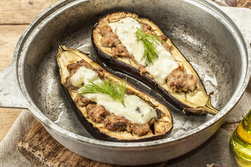 Stuffed eggplant ready to eat with ground meat, vegetables, and spices